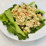 fresh salad greens with chicken salad and homemade salad dressing by shirley bovshow